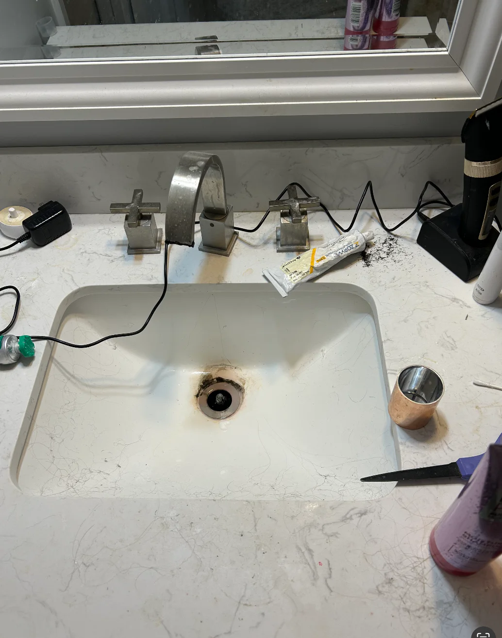 Bathroom sink and vanity before Kleaning360 cleaning